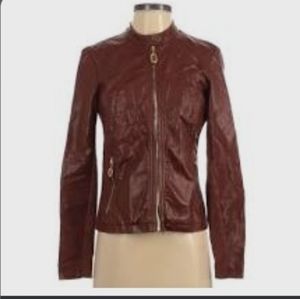 Ivaka Trump  brown faux Leather biker style jacket.